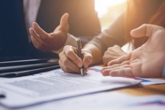 Business woman signing a contract document on office.teamwork successful Meeting Workplace strategy Concept